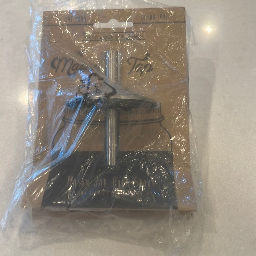 The mason tap pour spout, new with tags fits regular 8, 16, 32, oz jars.